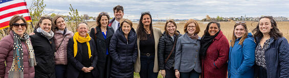 The Commonwealth Has a Plan and You Can Help image header, thirteen people posing for a picture.