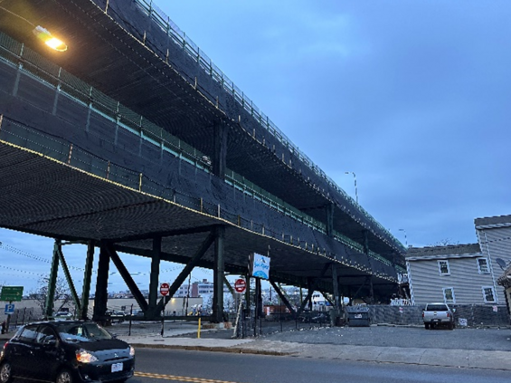 Another section of the Tobin Bridge in Chelsea encased in a netting system to catch paint chips.