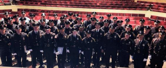 Local Police Officers Pose at a Graduation Ceremony from the MPTC Police Academy
