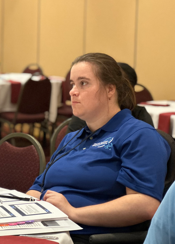 Amber Pettell sitting in an information session.