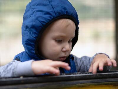 A child wearing a hood
