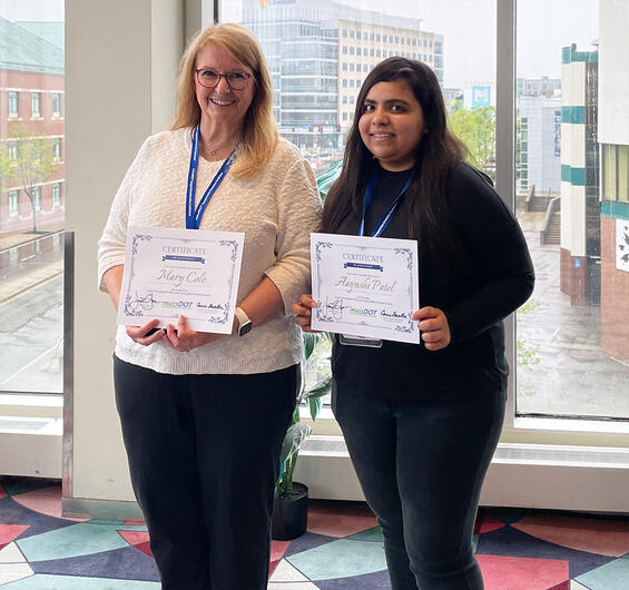 2025 Work Zone Billboard contest winners. Second place winner Mary Cole (left) and first place winner Aayushi Patel (right)