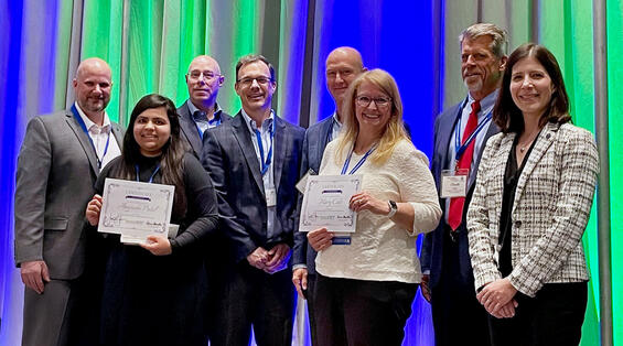 Jonathan Gulliver, Carrie Lavallee, Neil Boudreau, Chuck Latvis, Jeff Mahoney, and Josh Katz, Aayushi Patel, and Mary Cole group photo at the Innovation Conference