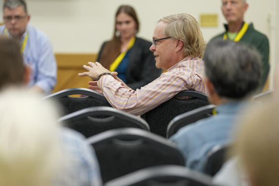 Attendee mid-conversation