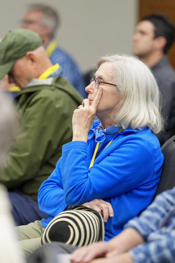 Attendee listening to speaker