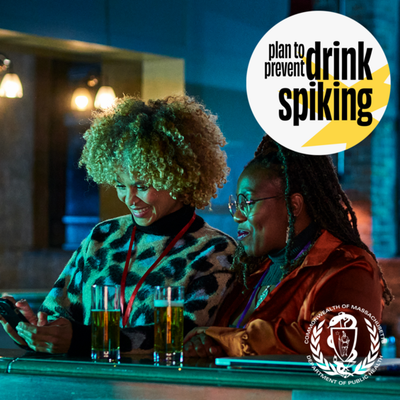 Two friends drinking and chatting at a bar. The text reads "plan to prevent drink spiking".