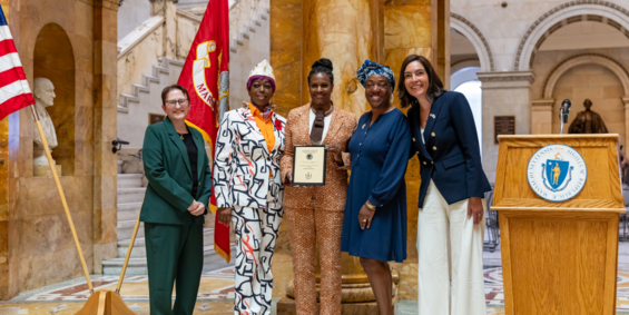Image of Ashley Booker accepting her award