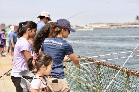 A fishing clinic on a pier.
