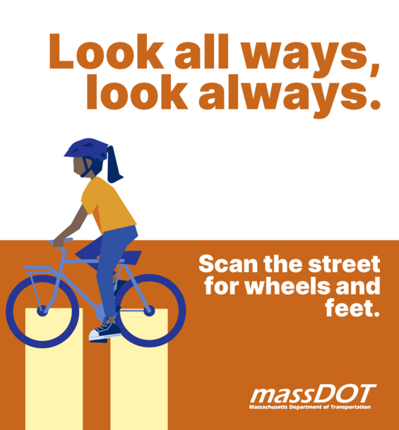 A bicyclist uses a cross walk