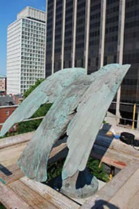 Rear view of Beacon Hill Monument eagle before treatment