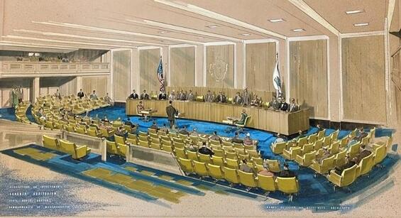 Drawing of the Gardner Auditorium showing rows of yellow seats, blue carpet and legislators seated at the dais