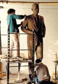 Artists working on the statue of President Kennedy