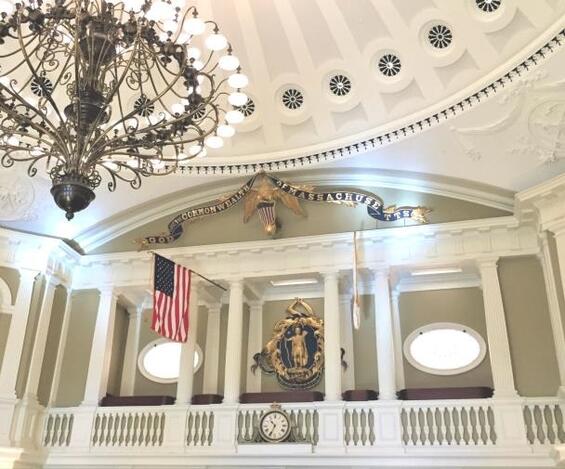 Gilded eagle and state seal in the Senate Chamber