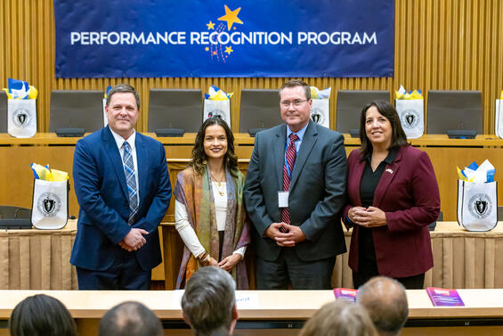 (L-R) Undersecretary Reilly, Cellucci Winner Renata Mauriz, Greg Rooney, and Lieutenant Governor Kim Driscoll