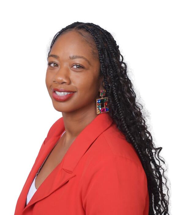 Kristin smiles at the camera