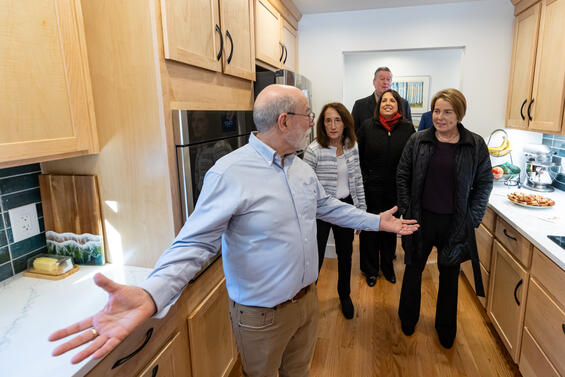 Lexington homeownes Mark and Linda Adler show their new ADU to Governor Healey, Lieutenant Governor Driscoll and Secretary Augustus