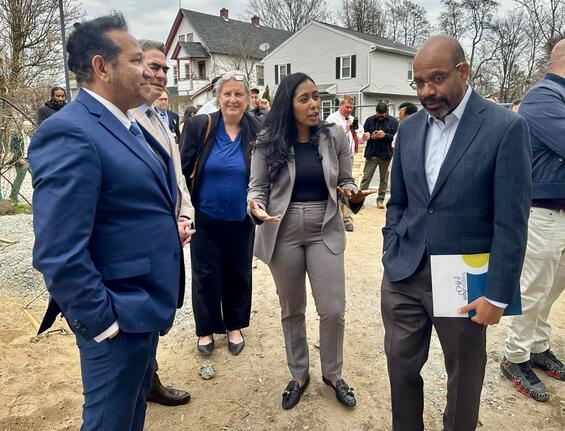 Secretary Juana Matias tours a housing construction site in Springfield