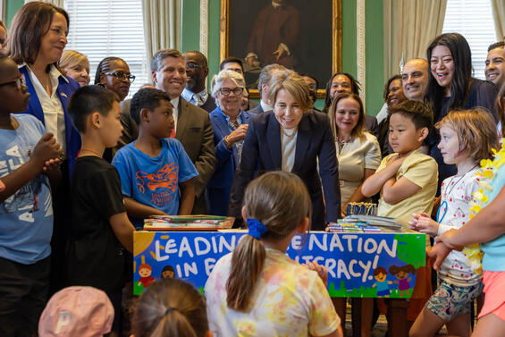 Governor Healey surrounded by students