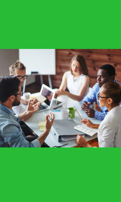 a group of diverse people meeting around a table to discuss projects.