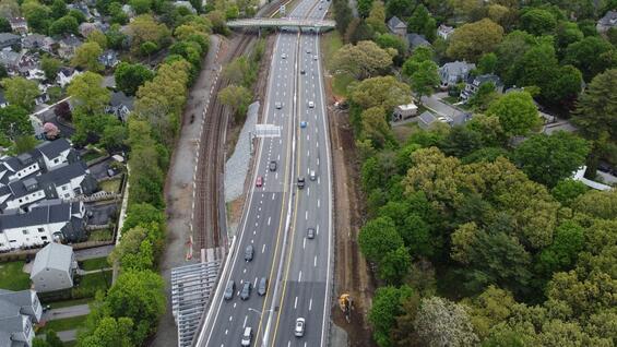 Widened I-90 bridge over the MBTA Commuter Rail, Utility Relocations and Noise Wall Preparations