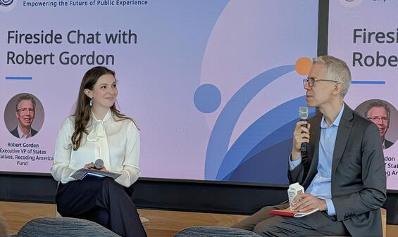 Chief Digital Officer Devyn Paros interviewing guest speaker Robert Gordon during the fireside chat.