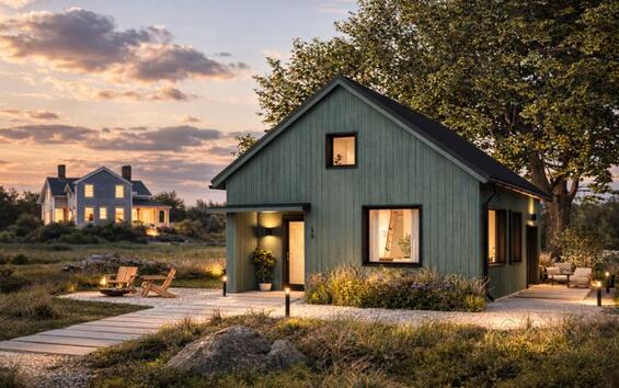 An artistic rendering of a small cottage home at sunset with the warm glow of lights coming from the windows