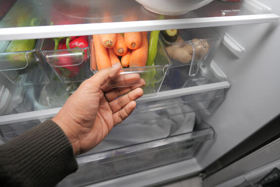 Fresh produce stored in a refrigerator