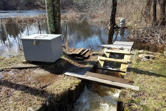 A fish video counter set up on a river.