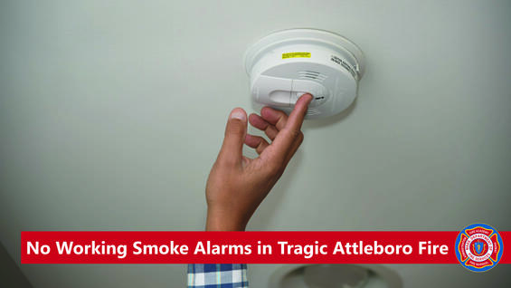 a hand reaching up to test a smoke alarm with the words "no working smoke alarms in tragic attleboro fire"