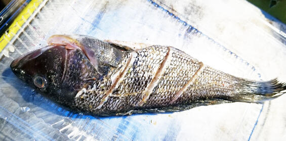 A pan fried fish.
