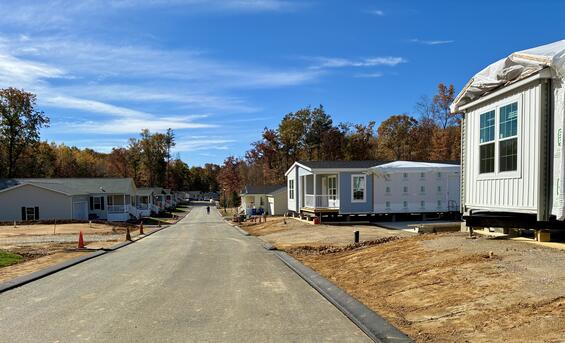 Modular homes line a street in Sturbridge.