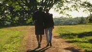 A couple walking together.