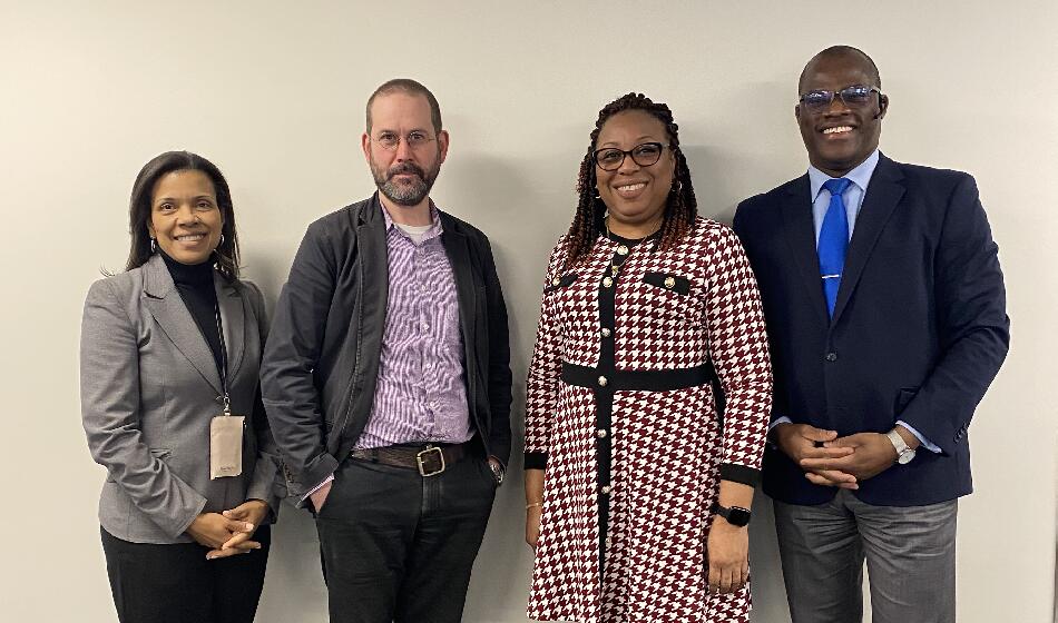 Narda Berrios, OLA Senior Manager; Thomas Smyth, OLA Interpreter Scheduler; Leslie Martinez, Spanish Staff Interpreter; and Convington Bien-Aime, Haitian Creole Staff Interpreter.