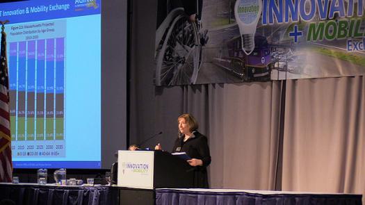presenter at a podium
