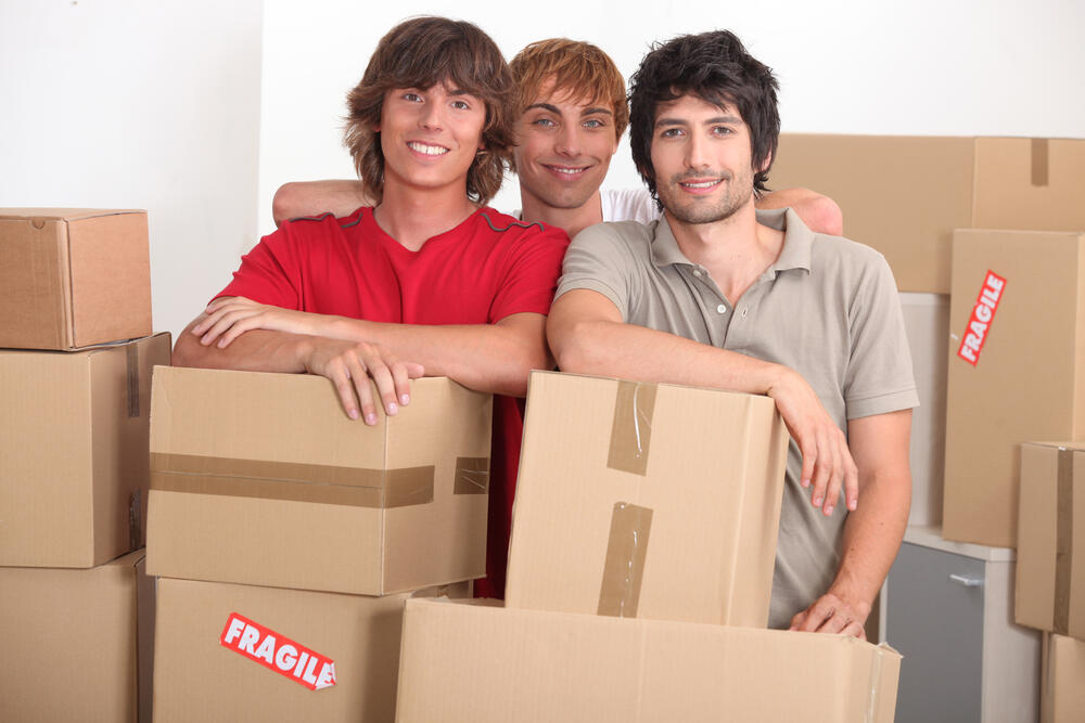 College students with moving boxes