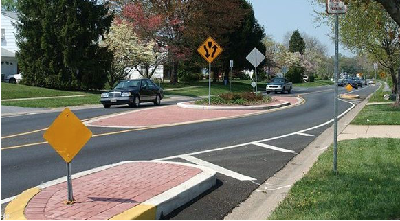 Two lane roadway with lateral chicane.