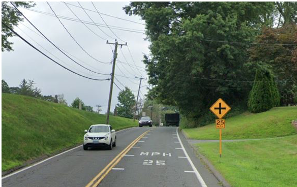 Two lane road with optical bars on right lane