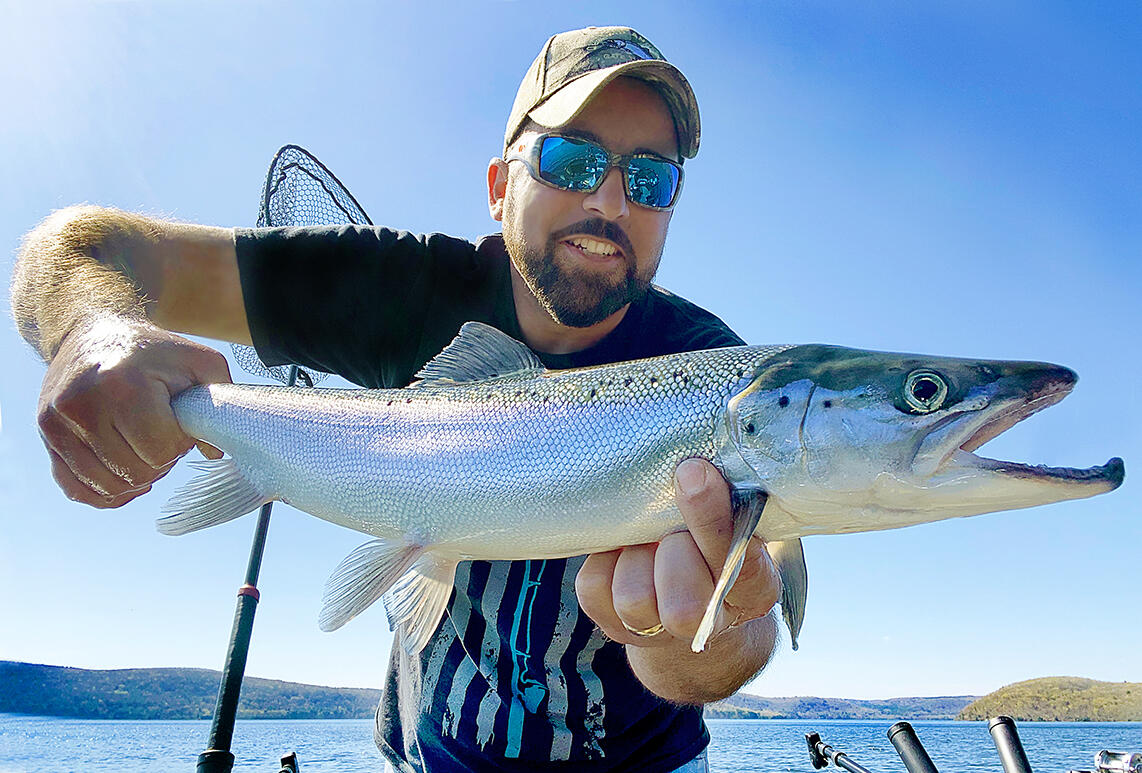 Angler displays trophy landlocked salmon