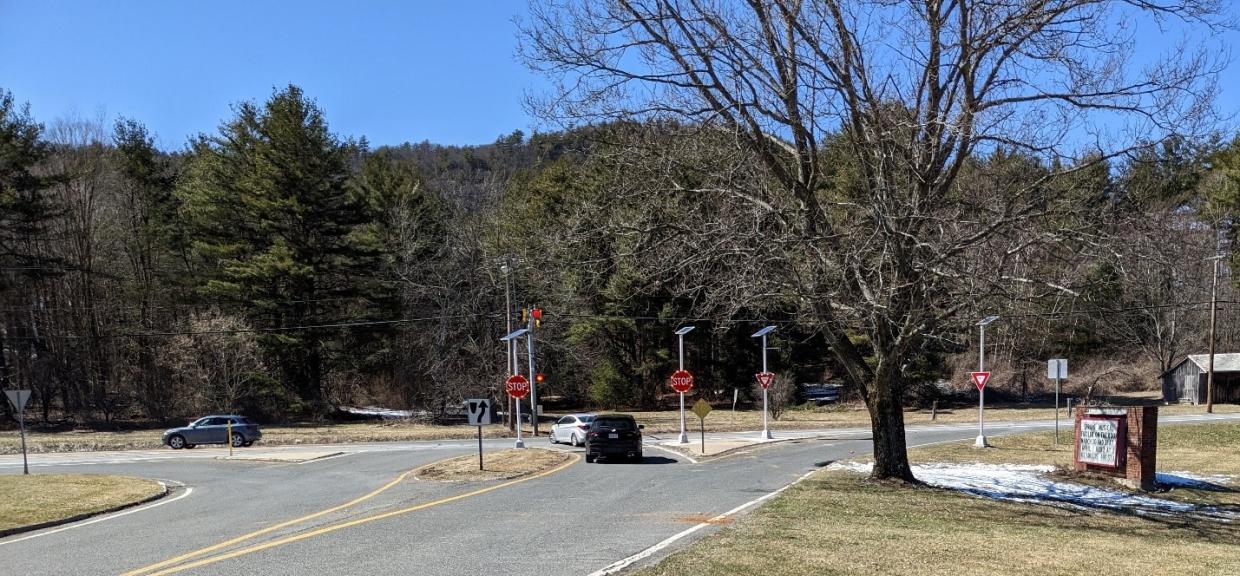 Photographs show the Intersection Conflict Warning System (ICWS) at the intersection of Route 7 and Monument Mountain Regional High School Drive in Great Barrington