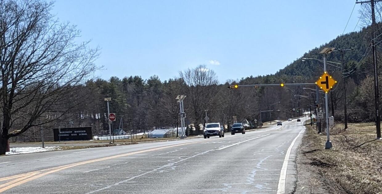 Photographs show the Intersection Conflict Warning System (ICWS) at the intersection of Route 7 and Monument Mountain Regional High School Drive in Great Barrington