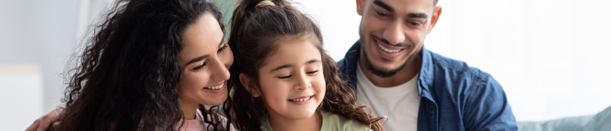 Young child with caregivers