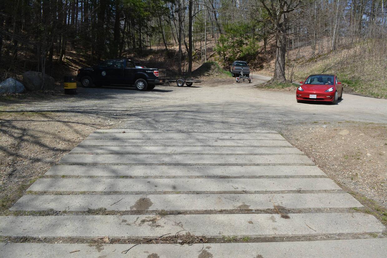 limited parking just above the boat ramp, gravel