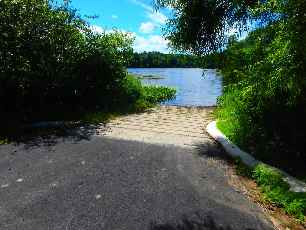 concrete pad ramp suitable for trailered craft terminating at waters edge