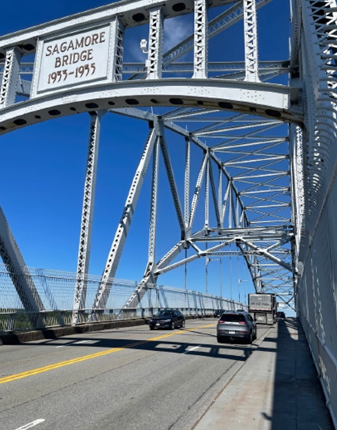 Driving under the Sagamore Bridge sign