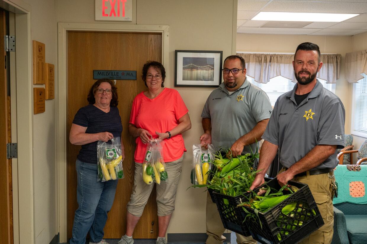 Staff visit community organizations to donate produce grown from the farm.