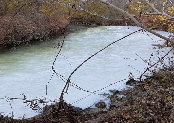 Cloudy wastewater discharged into the Hoosic River 