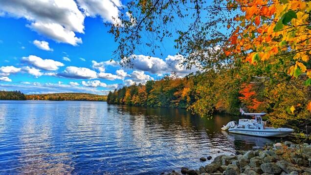 Massachusetts Environmental Police Boat on the shoreline of the Otis Reservoir