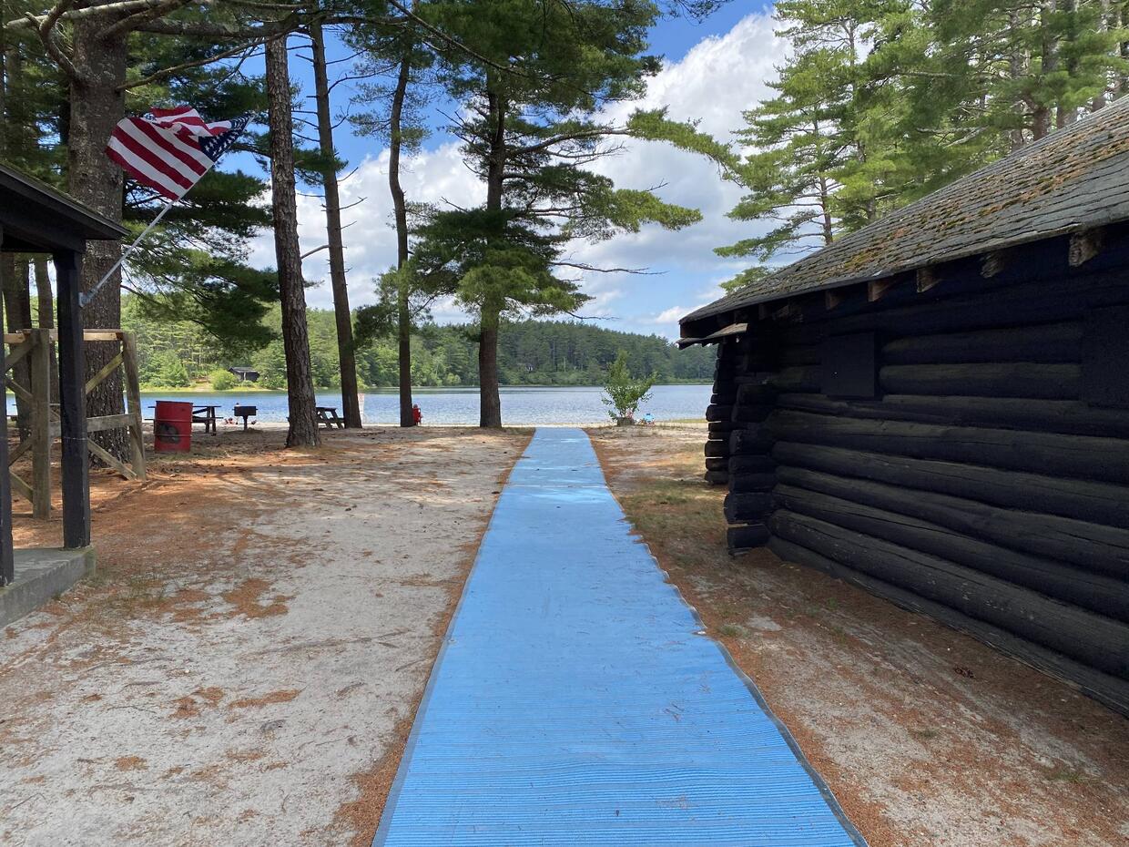 Walking mat from the parking lot to the beach at Fearing Pond