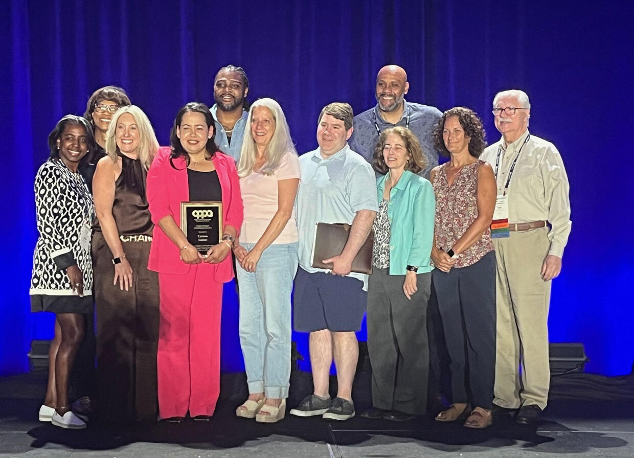 Dr. Carmen Gomez with colleagues and the APPA president