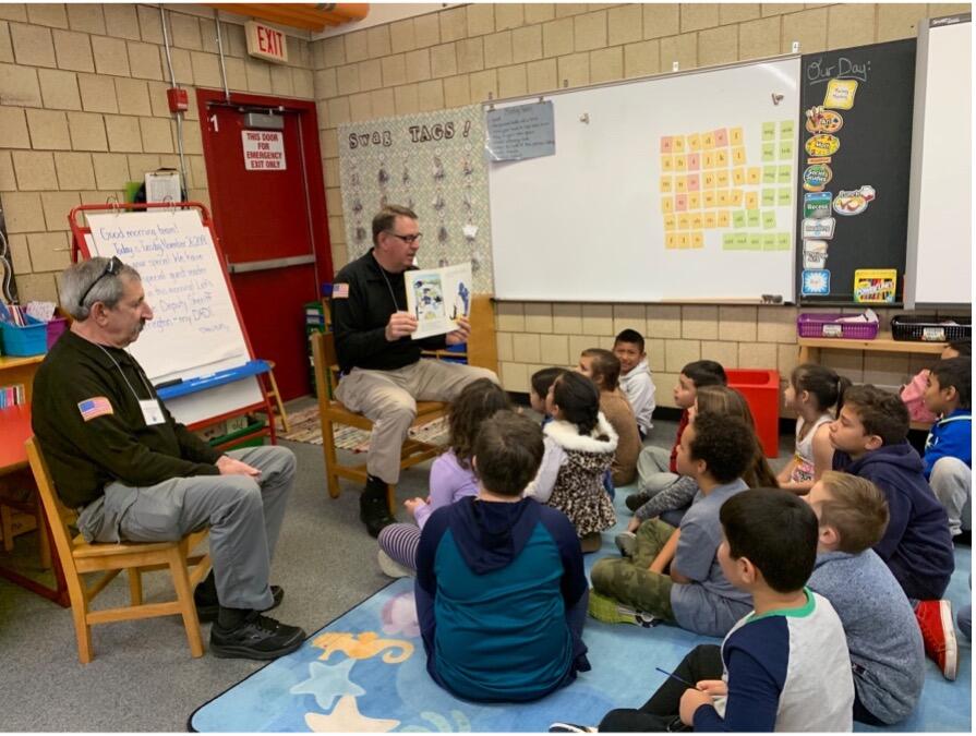 Sheriff Perelman and his staff visit local schools to read to kids.